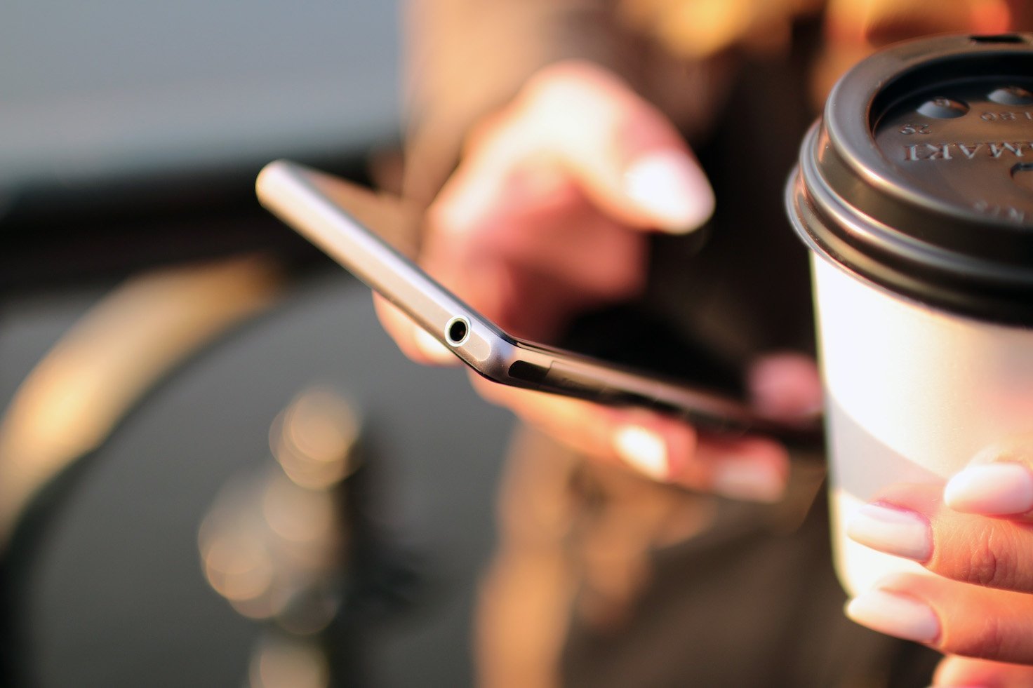 hands-coffee-smartphone-technology resized.jpg
